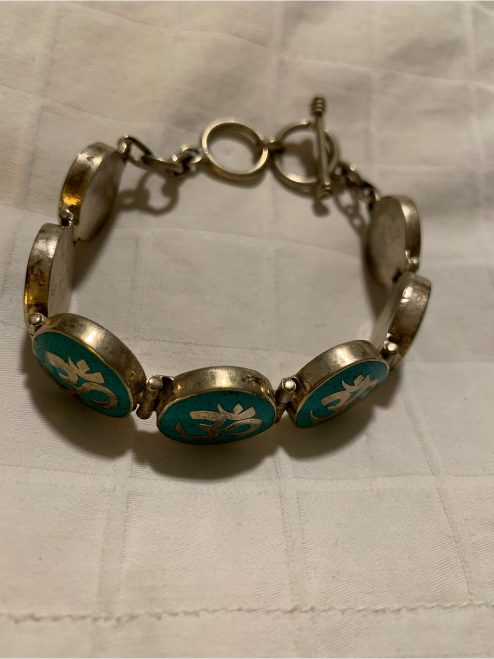 Tibetan Silver “Om” Link Bracelet with Inlaid Turquoise and White Metal
